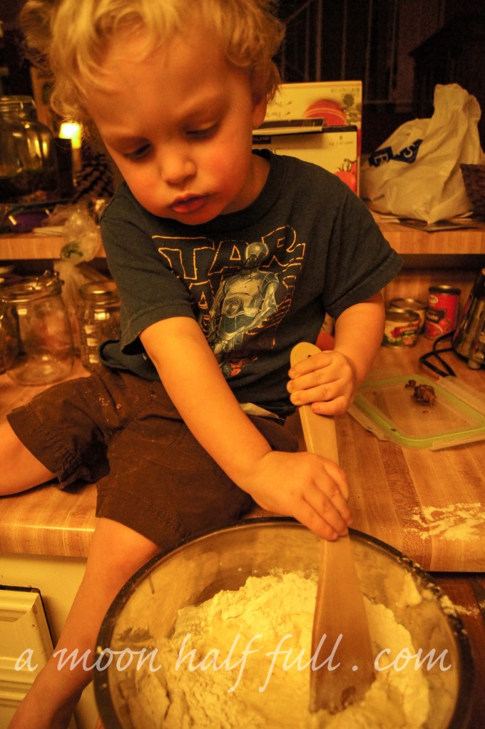 Helping Mama make pancakes